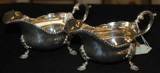 Pair of silver sauceboats, scrolled handles & shell feet, Birmingham 1966, Barker Ellis Silver Co